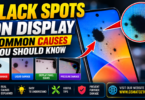Smartphone screen with dark black spots spreading across it with a magnified close-up showing pixel-level damage